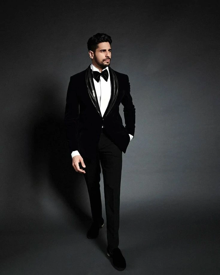 men standing tuxedo wedding dress